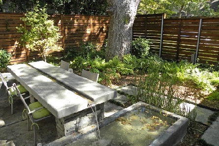 Dining table doubles as a water feature
