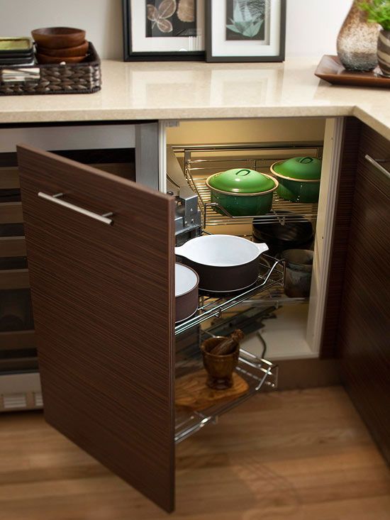 Creative kitchen storage idea with pull out door. #kitchen #storage #organization #cupboards #cabinets #shelves #decoratingideas #decorhomeideas