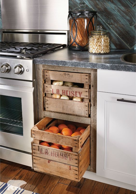 Kitchen storage idea from wooden crates for fruits and vegetables. #kitchen #storage #organization #cupboards #cabinets #decoratingideas #decorhomeideas #drawer