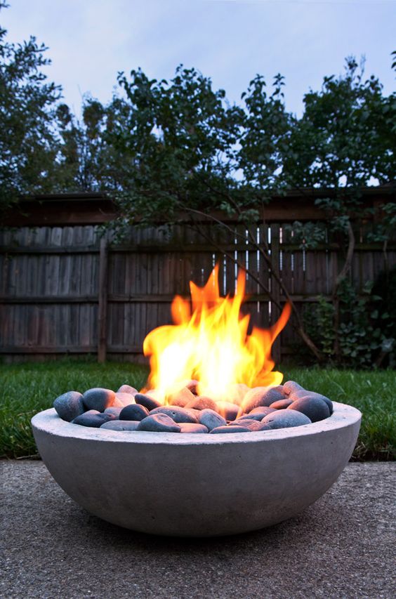 Concrete bowl fire pit idea #firepit #exterior #patio #decoratingideas #cozy #decor #garden #backyard #fire #design #decorhomeideas