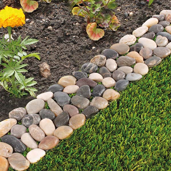 Pretty Polished Multicolored Stone Edge #lawnedging #lawnedgingideas #landscaping #gardening #gardens #gardenideas #gardeninigtips #decorhomeideas