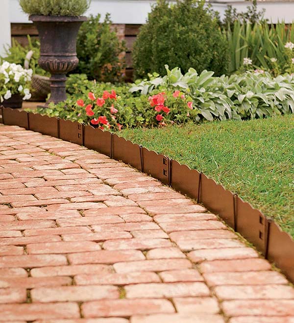 Short Scalloped Copper Edge Along Brick Path #lawnedging #lawnedgingideas #landscaping #gardening #gardens #gardenideas #gardeninigtips #decorhomeideas