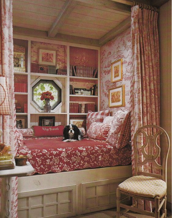 33 Lovely Reading Nooks for Ultimate Relax and Tranquility 34 French country reading nook in red and floral motives #readingnook #nook #readingcorner #decoratingideas #homedecor #cozynook #decorhomeideas