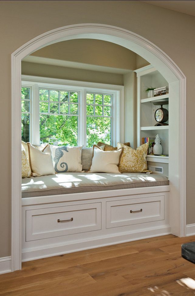 Great reading bay window reading nook with throw pillows and cushion, painted in white #readingnook #nook #readingcorner #decoratingideas #homedecor #cozynook #decorhomeideas