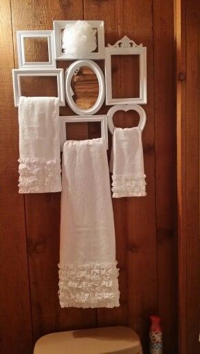 Picture frames turned into towel holder #diyproject #diy #makeover #homedecor #decorationideas #pictures #frames #vintage #decorhomeideas