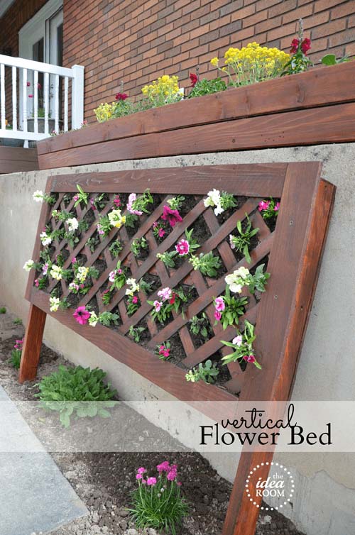 Vertical flower bed from wooden frame #flowerbed #gardens #decorhomeideas