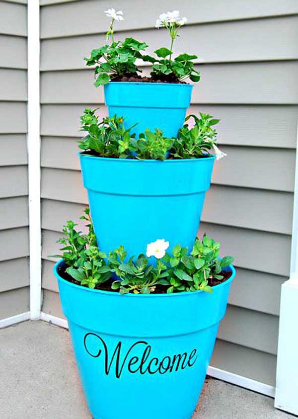 Tiered front door flower pots #flowerpot #planter #gardens #gardenideas #gardeningtips #decorhomeideas