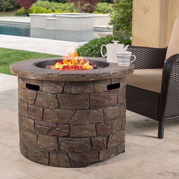 Round stone gas fire pit #firepit #gasfirepit #propanefirepit #firepitdesign #decorhomeideas