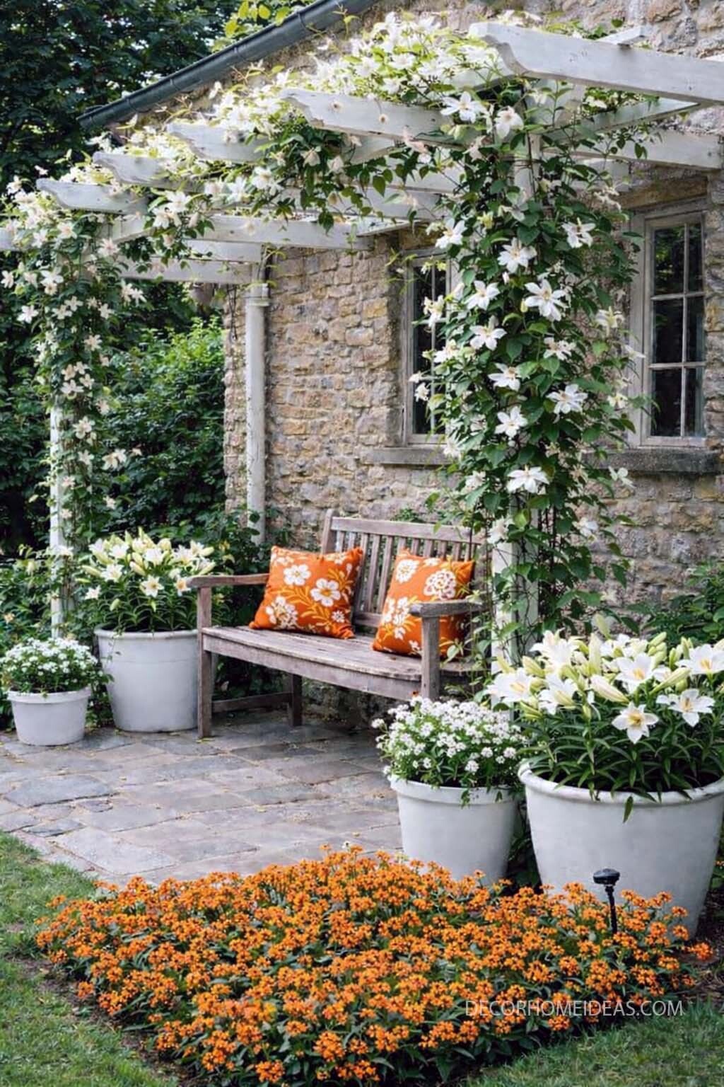 Charming Cottage Porch with Flower Covered Pergola