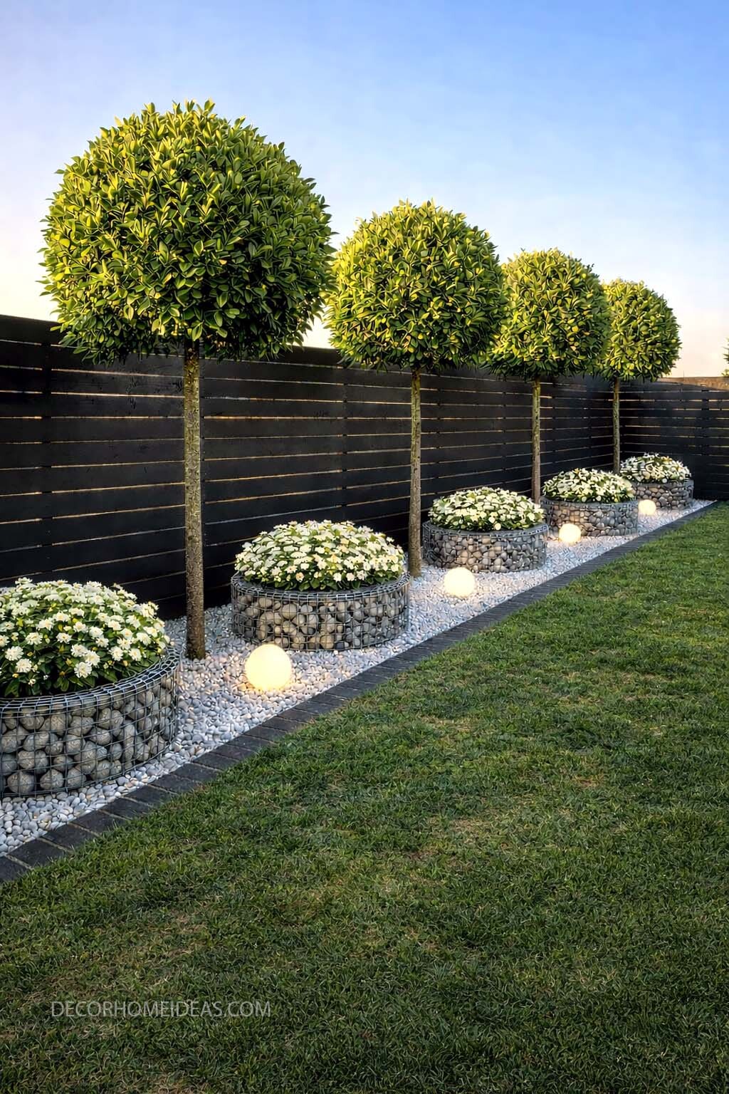 Modern Gabion Planter Border with Globe Lights for a Low Maintenance Backyard