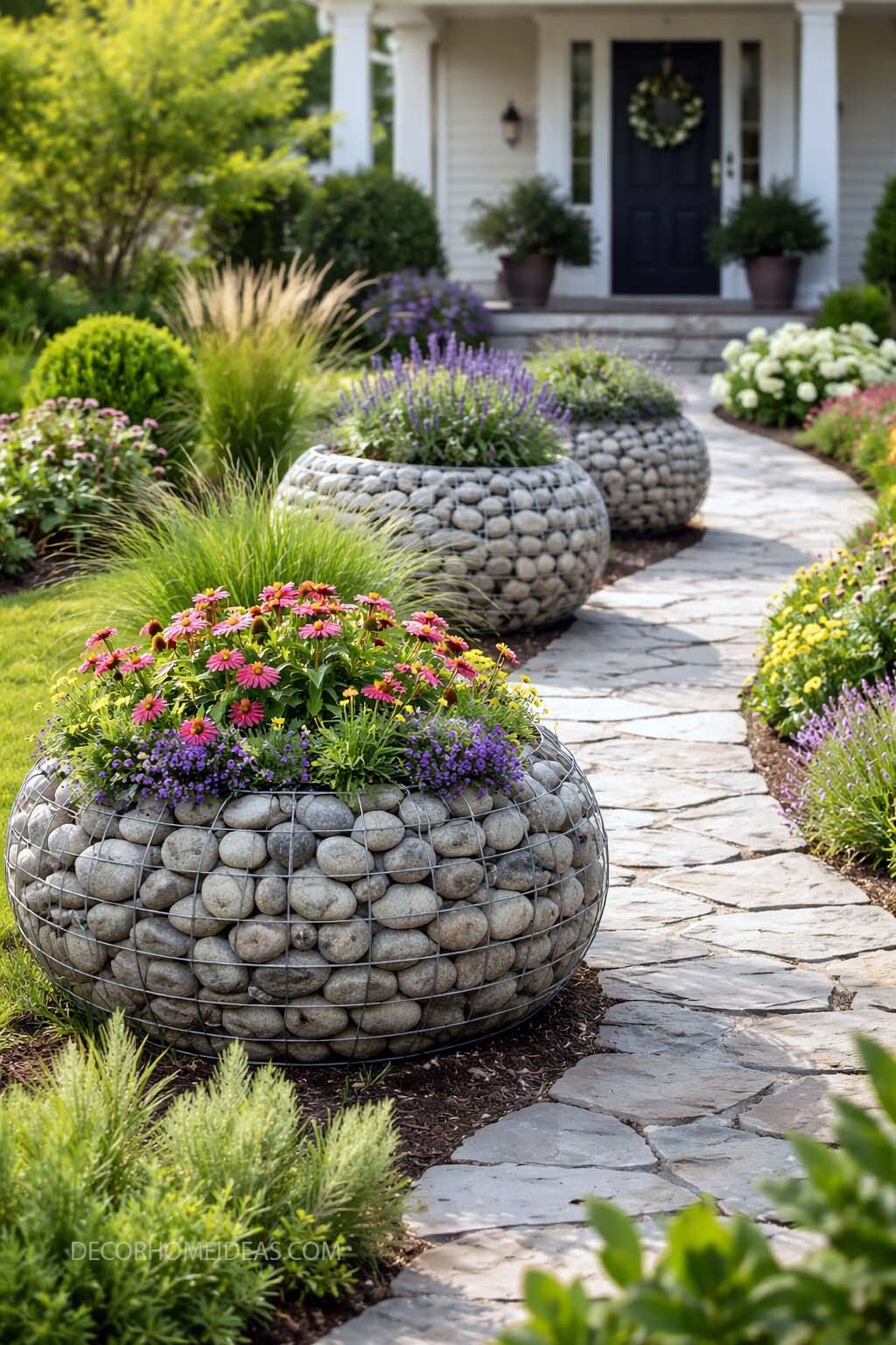 Round Gabion Planters Along Stone Garden Pathway
