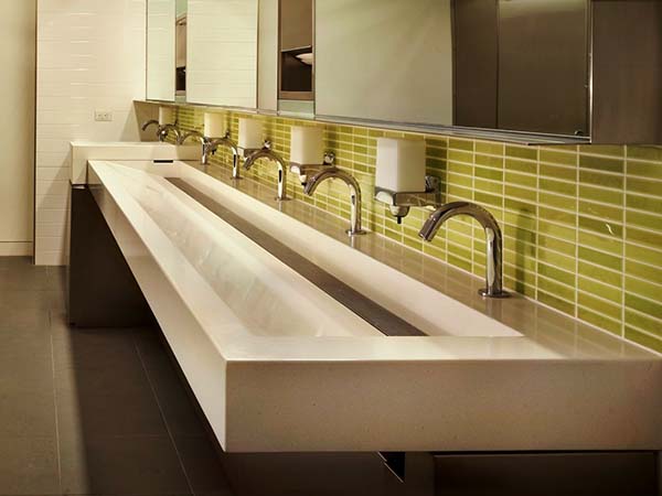 Bathroom trough sink in restaurant