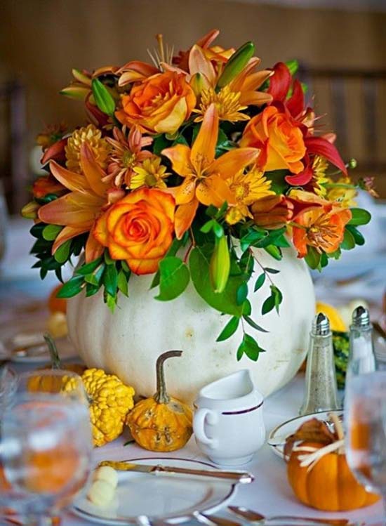 Colorful flowers pumpkin centerpiece #fallcenterpiece #falldecor #diy #falldecoration #thanksgiving #decorhomeideas #pumpkin