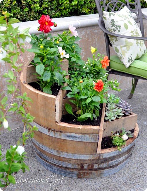 Cut out wine barrel flower planter #diy #winebarrel #flowerplanter #repurpose #decorhomeideas