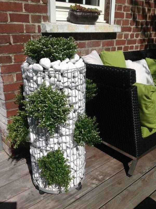 Gabion planter with white pebbles #gabion #gabionplanter #flowerplanter #gardenideas #decorhomeideas