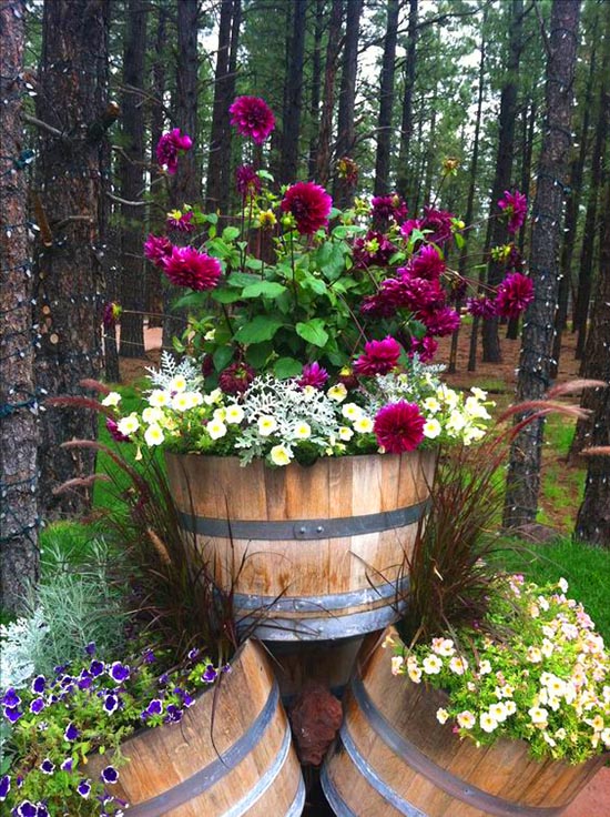 Pyramid of wine barrel planters #diy #winebarrel #flowerplanter #repurpose #decorhomeideas