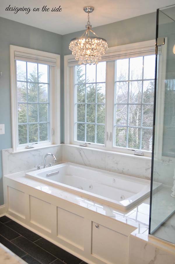 Bathroom tub with big windows surround