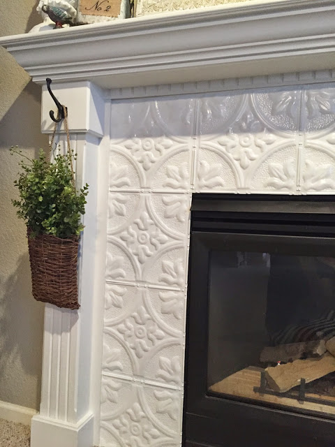 Tin Tile Fireplace Makeover #fireplace #fireplacedesign #tile #fireplacetile #decorhomeideas