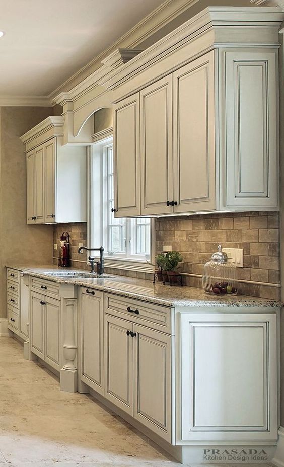 Antique White Kitchen Cabinets With Dark Countertop