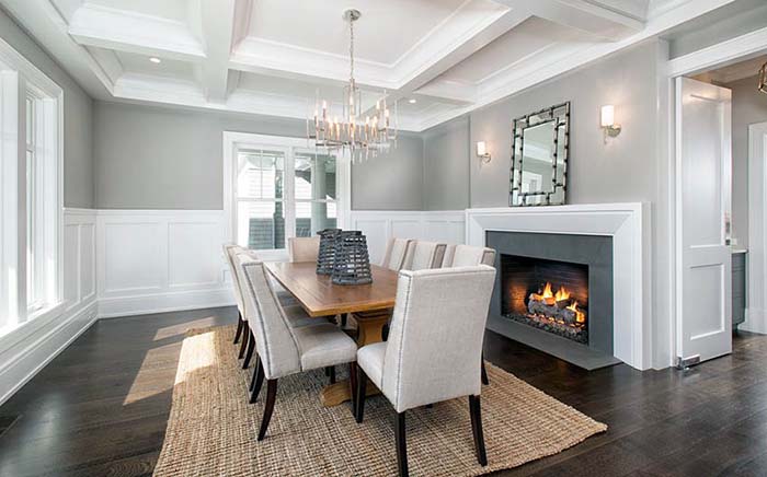 Dining Room With Fireplace and Winescoting