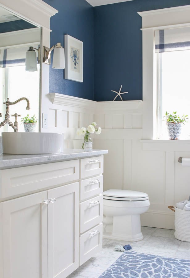 Navy Blue Bathroom With Wainscoting Wall