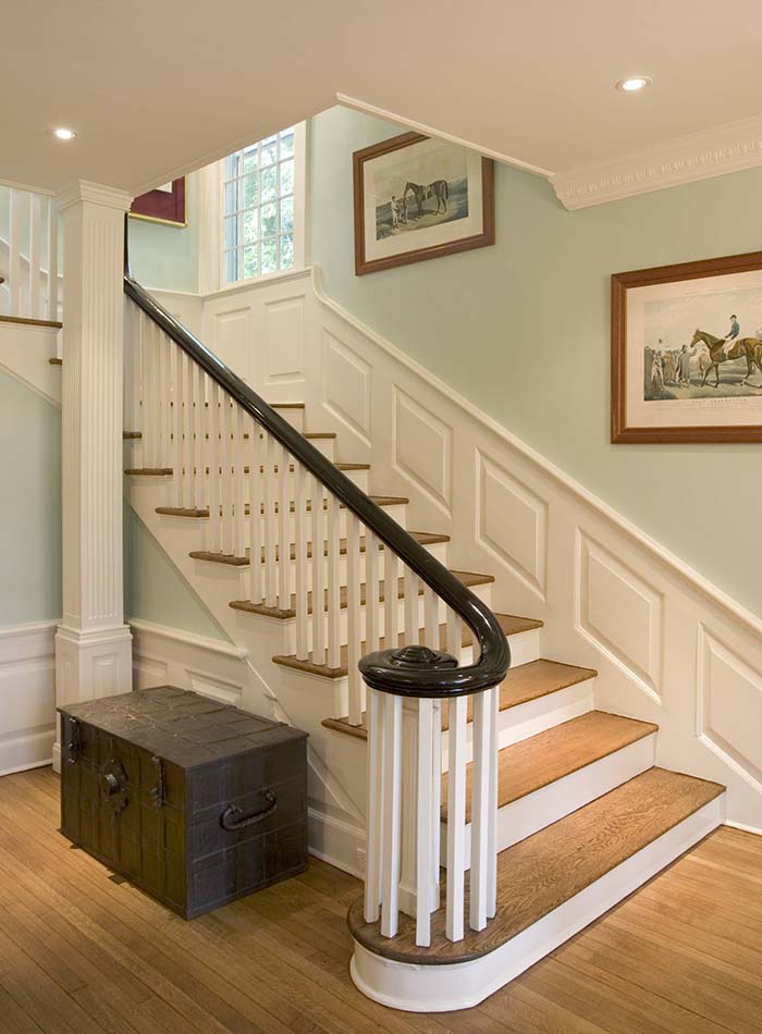 Pastel Green Wall Staircase With Wainscoting