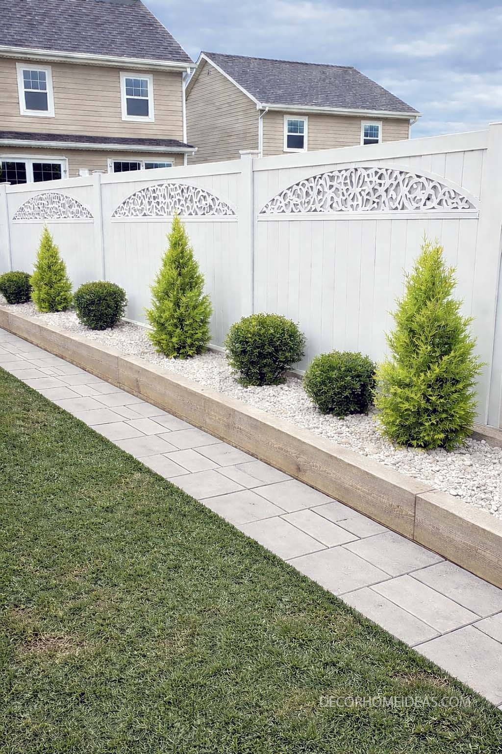 Modern Raised Garden Edging with Rock and Paver Border