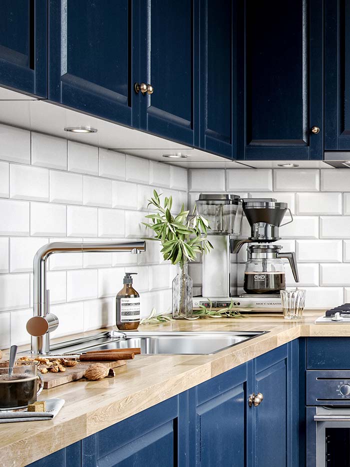 Navy Blue Kitchen With Tiled Backsplash