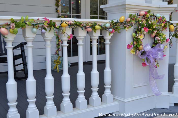 Porch Rail Decorated with Spring Egg Garland #easter #diy #porch #decor #decorhomeideas