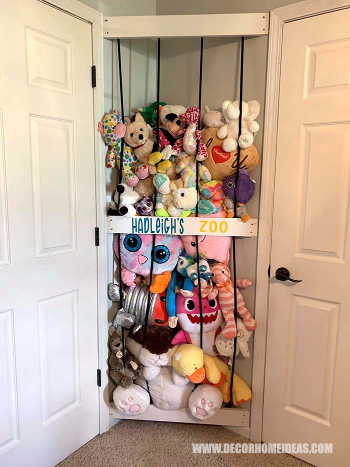 Corner Space Toy Storage. Perfect solution for an unused corner space. Easy DIY toy storage project. #diy #toystorage #decorhomeideas