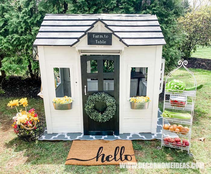 DIY Outdoor Farmhouse Playhouse Makeover. How to convert and old and worn playhouse into an adorable outdoor farmhouse style playhouse. #farmhouse #playhouse #makeover #diy #decorhomeideas