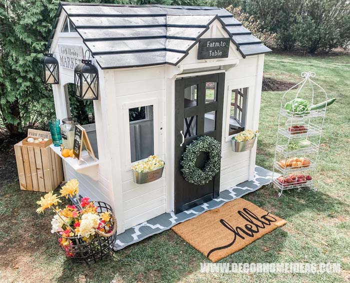 DIY Outdoor Farmhouse Playhouse Makeover. How to convert and old and worn playhouse into an adorable outdoor farmhouse style playhouse. #farmhouse #playhouse #makeover #diy #decorhomeideas