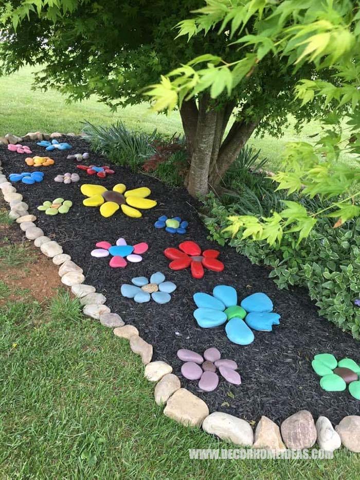Painted Rocks Flower Garden. Cute idea to make flowers from painted rocks and decorate your garden or backyard. Perfect craft for you and your kids. #paintedrocks #garden #diy #crafts