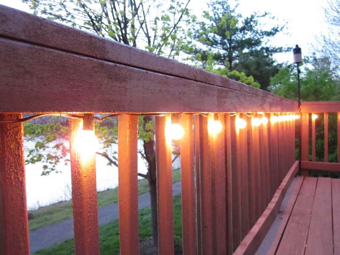 Edison Bulb Porch Railing String Lights #porch #summer #decor #decorhomeideas