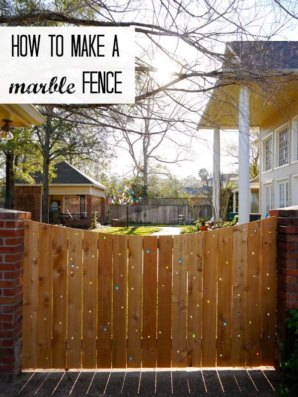 Fanciful Glass Marble Embellished Fence #farmhouse #summer #decor #decorhomeideas