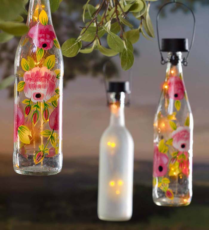 Hanging Solar Bottles Turned Lanterns #diy #solar #lights #solarlight #garden #decorhomeideas