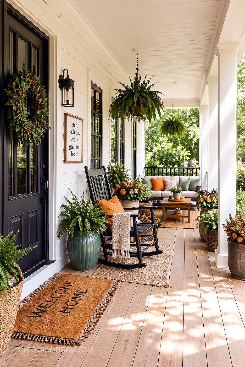 Cozy Fall Front Porch Decor with Warm Orange Accents and Rustic Charm