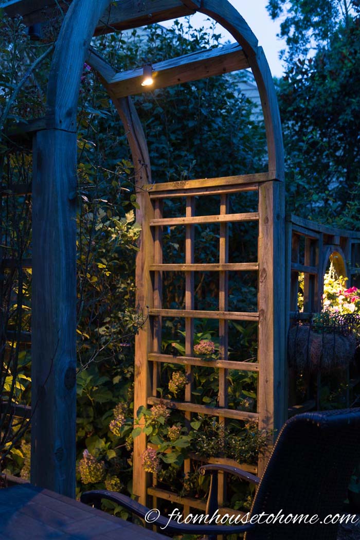 Lights Hanging from an Arbor #lighting #landscape #garden #decorhomeideas