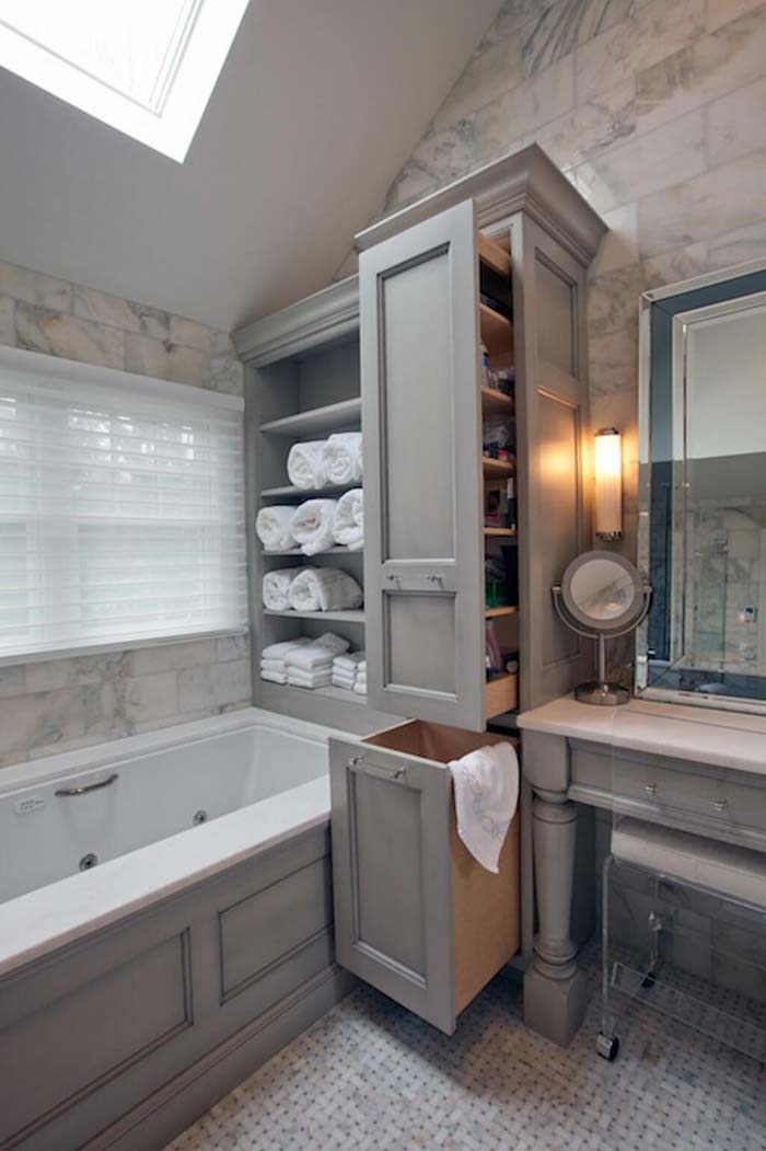 Sliding Shelves and Hamper De-clutter Bathroom Space #storage #builtin #decor #decorhomeideas