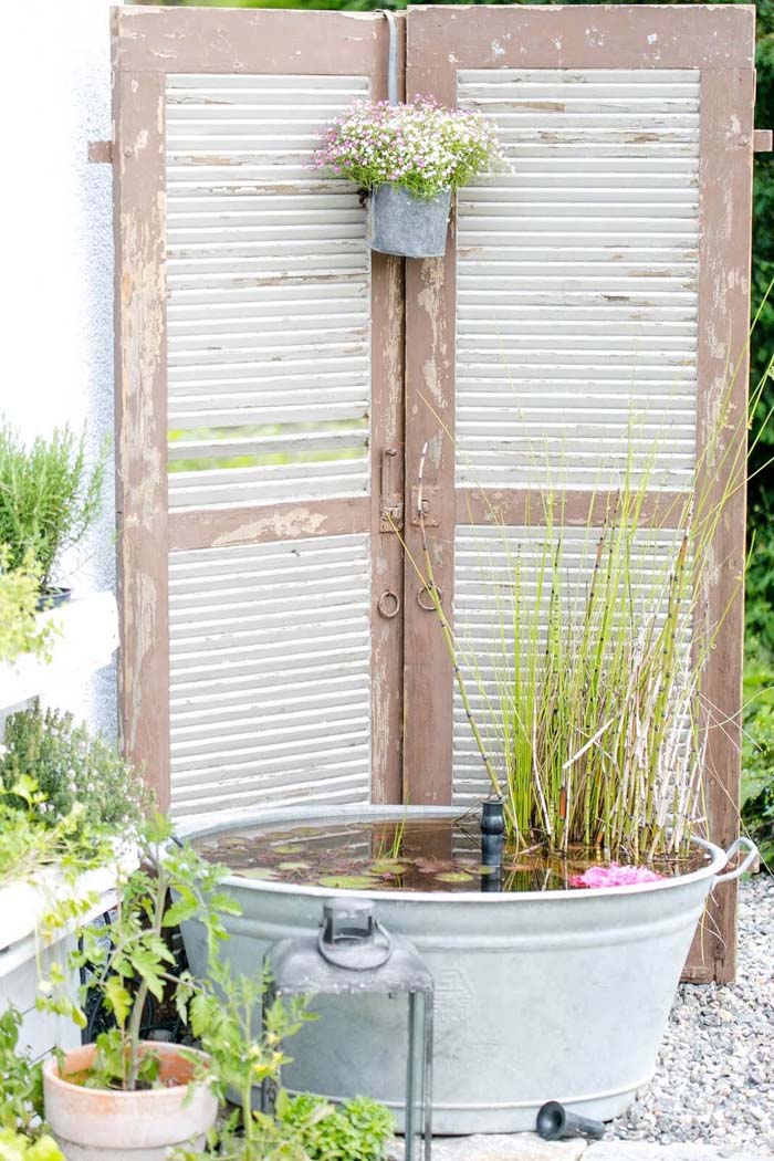 Backdrop for a Homemade Lily Pond #shutter #repurpose #decor #decorhomeideas