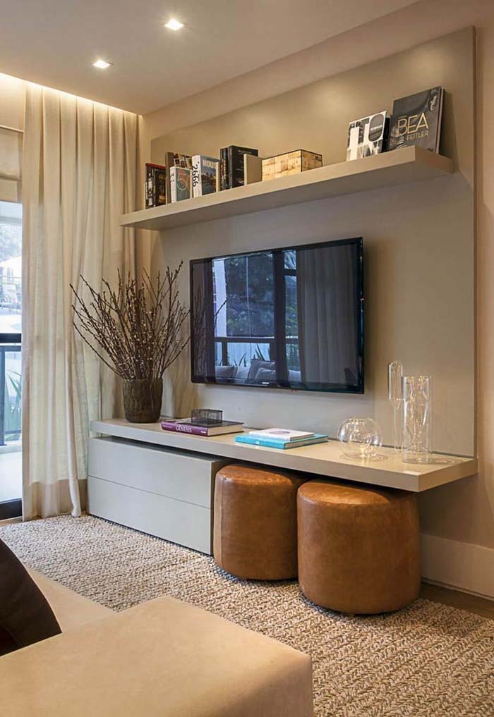 Extra Seating Tucked Away Under the TV #livingroom #design #decorhomeideas