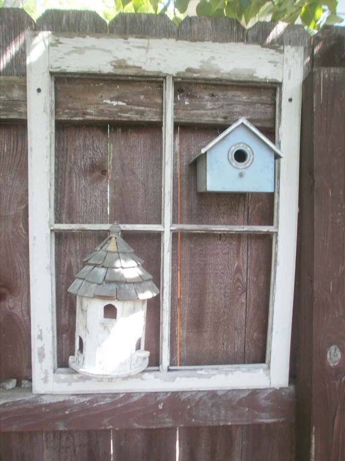 Frame a Cute Birdhouse on the Fence #old #window #garden #decorhomeideas