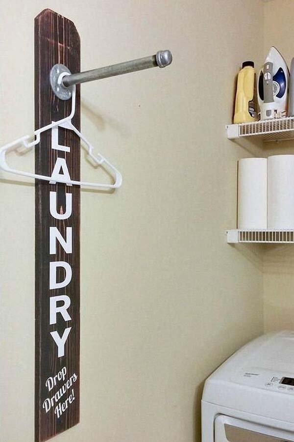 Laundry Room Sign with Built-in Hanging Rod #laundry #vintage #decor #decorhomeideas