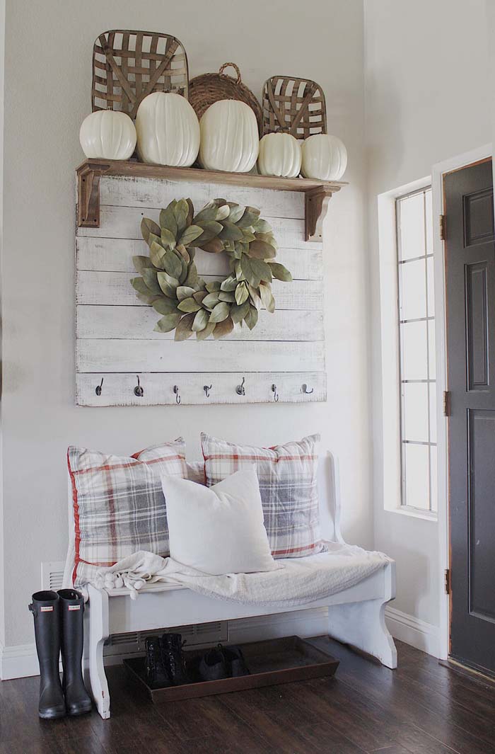 Mounted Wreath and Plaid Pillows in Pastels #small #entryway #decor #decorhomeideas