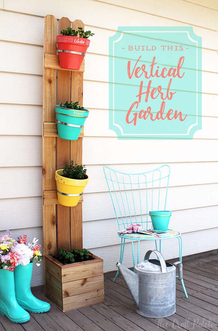 Vertical Planter with Fence Slats and Terra Cotta Pots #flowerpot #clay #garden #decorhomeideas