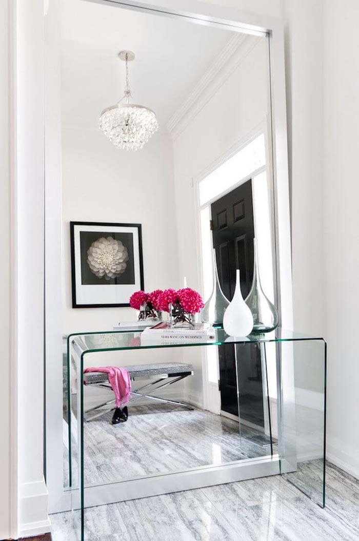Sophisticated Metropolitan Design #entry #table #decorhomeideas