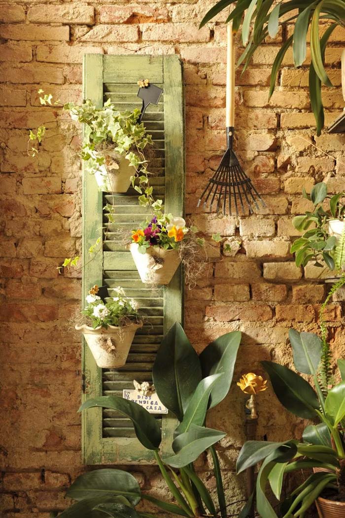 Wall Shutter Holding Flower Pots #shutter #repurpose #decor #decorhomeideas