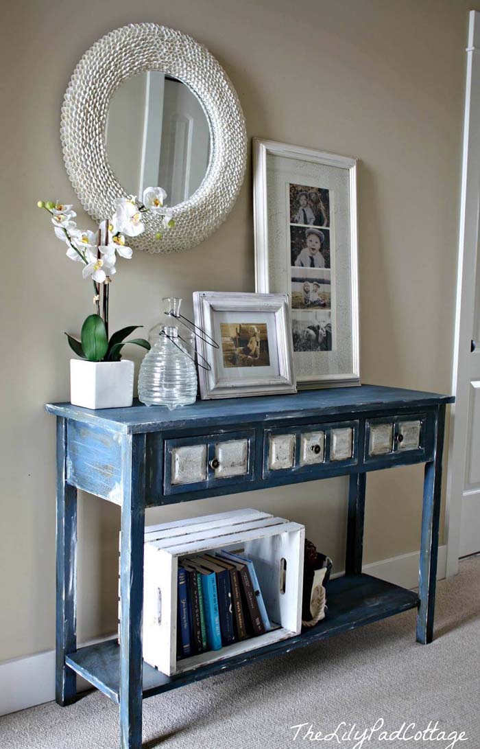 White Decor Accents On Distressed Blue Entry