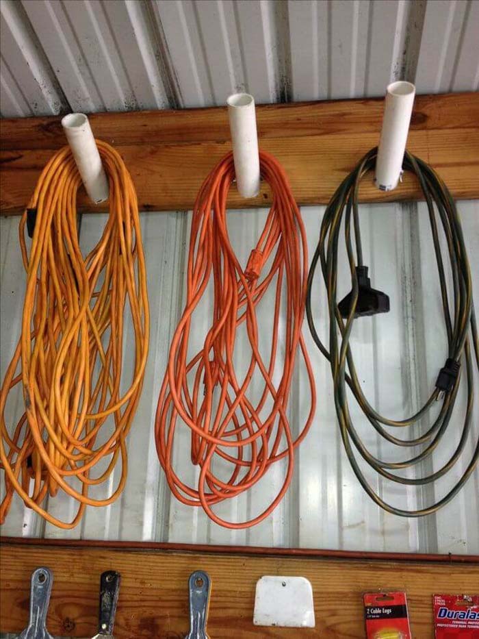 Easy PVC Pipe Cord Collectors #garage #organization #declutter #decorhomeideas