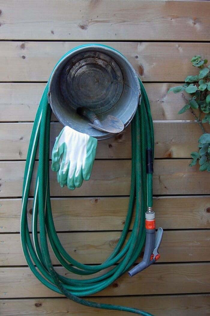 Outside Hose and Gardening Organization Featuring Bucket #galvanized #tub #bucket #decorhomeideas